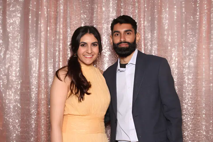 Open air photo booth at Fresno wedding with rose gold sequen backdrop 1